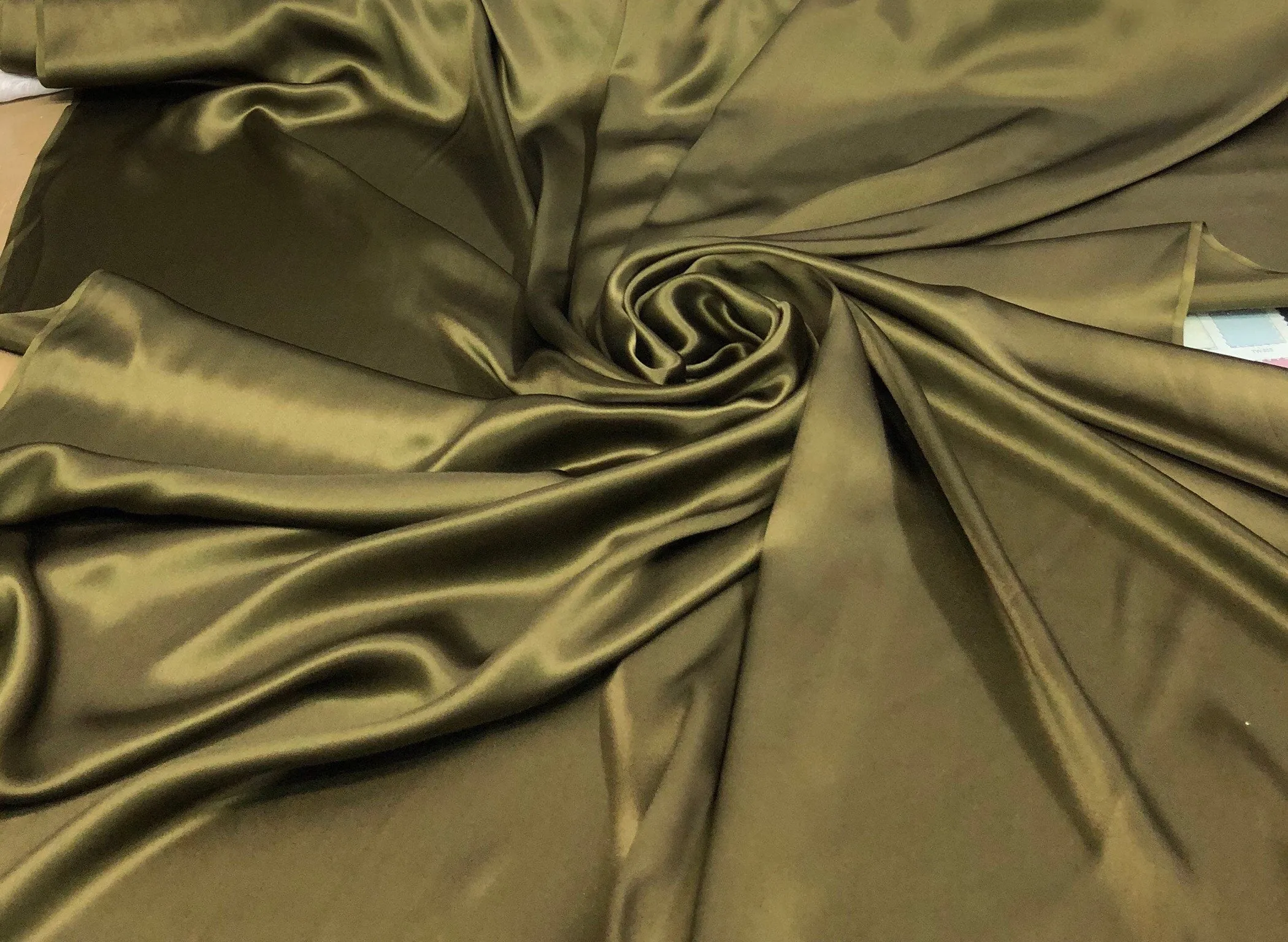 Silk charmouse 54&quot; wide    Beautiful dark olive green color silk satin charmouse fabric sold by the yard